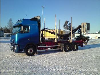 Camión para transporte de madera VOLVO FH16 550: foto 1