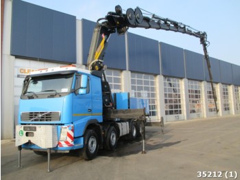 Camión volquete Volvo FH 16.550 8x4 with Effer 125 ton/meter crane and: foto 1