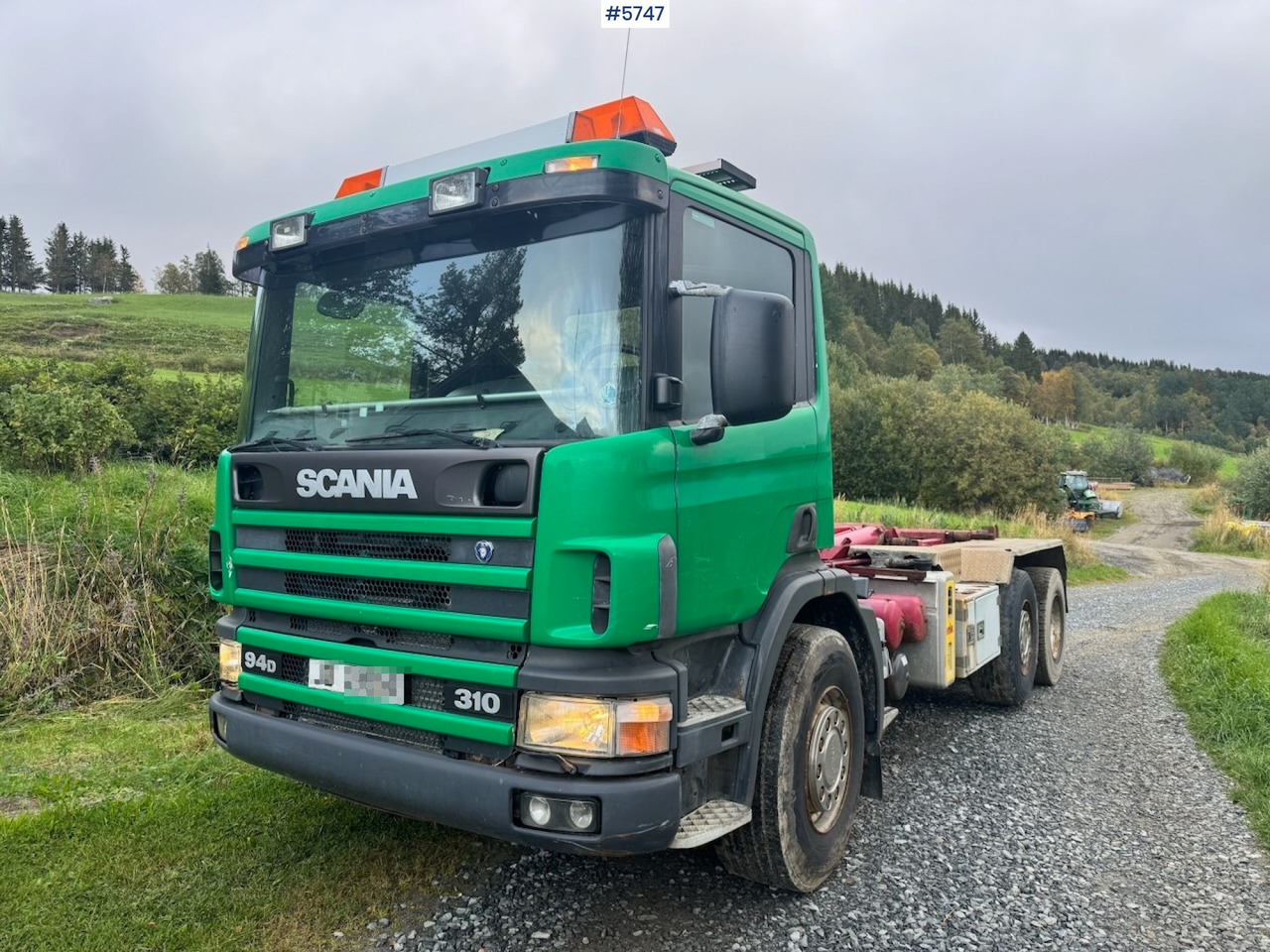 Camión multibasculante 1998 Scania 94D 310 Hook‑truck