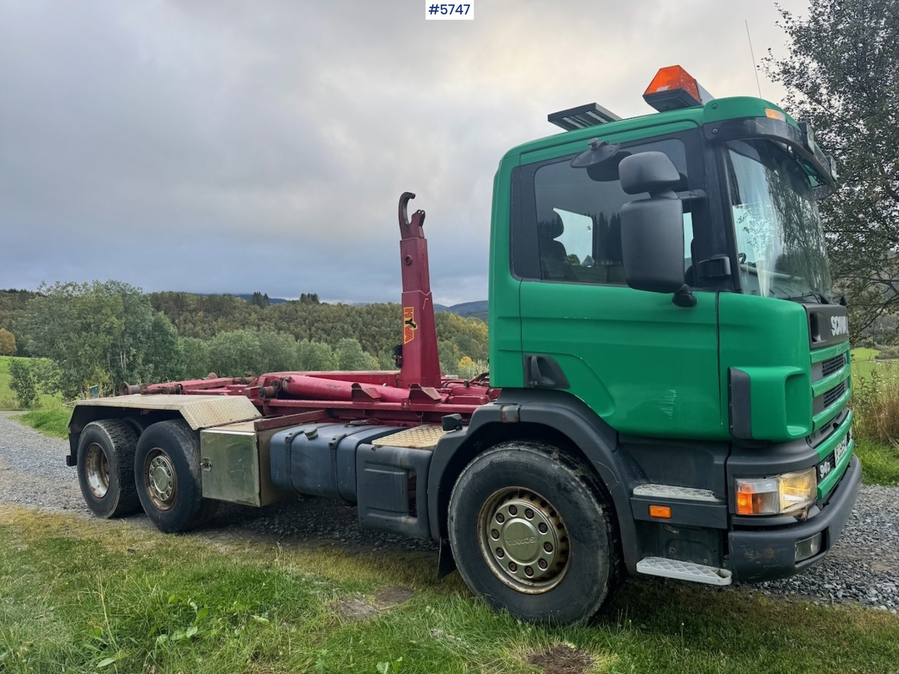 Camión multibasculante 1998 Scania 94D 310 Hook‑truck