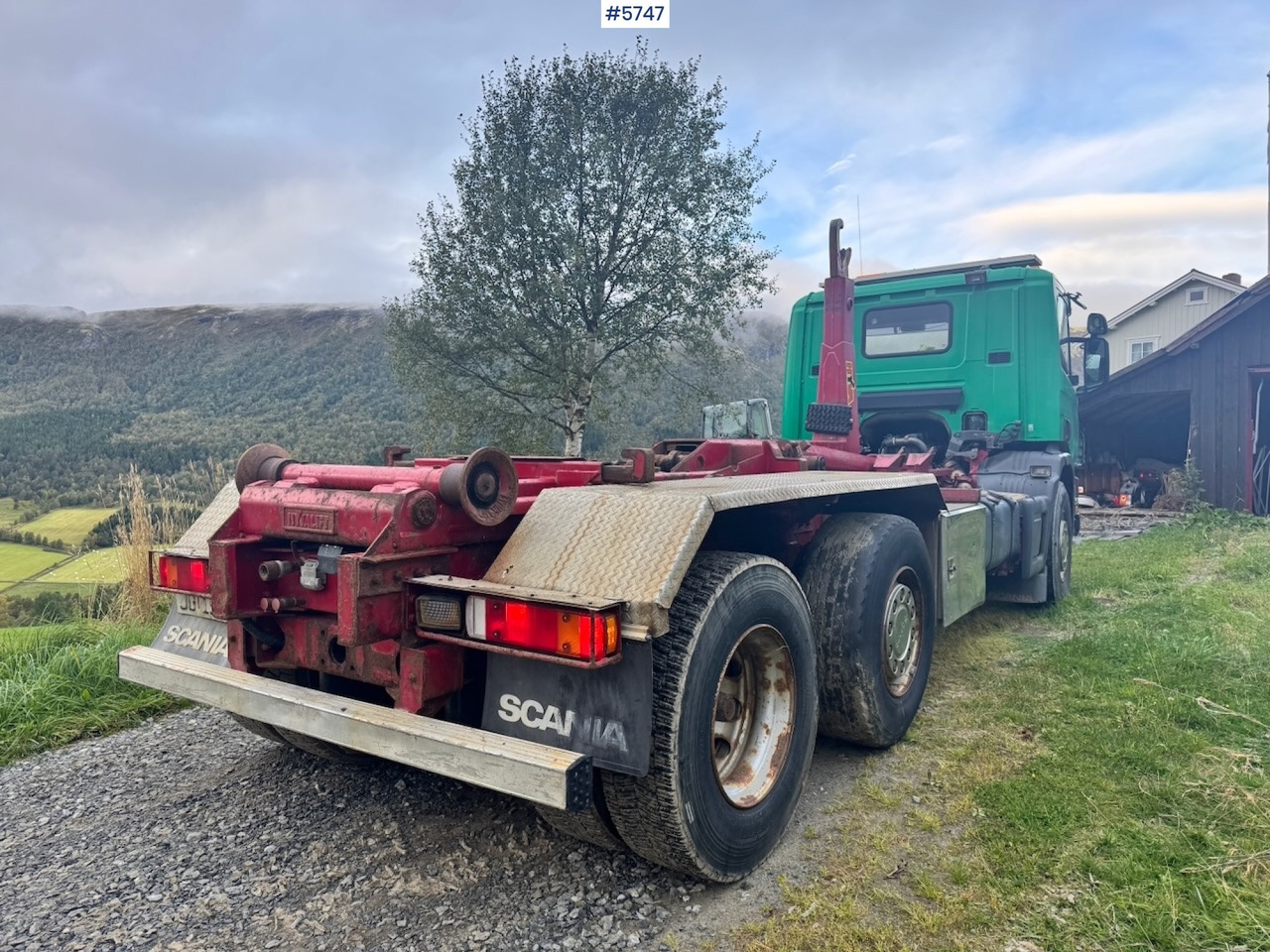 Camión multibasculante 1998 Scania 94D 310 Hook‑truck