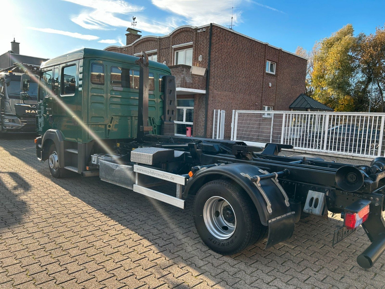 Camión multibasculante MAN 12.250 Doppelkabine Abroller