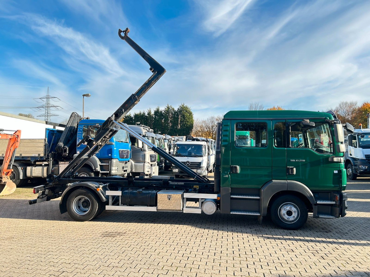 Camión multibasculante MAN 12.250 Doppelkabine Abroller