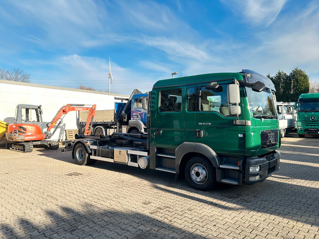 Camión multibasculante MAN 12.250 Doppelkabine Abroller