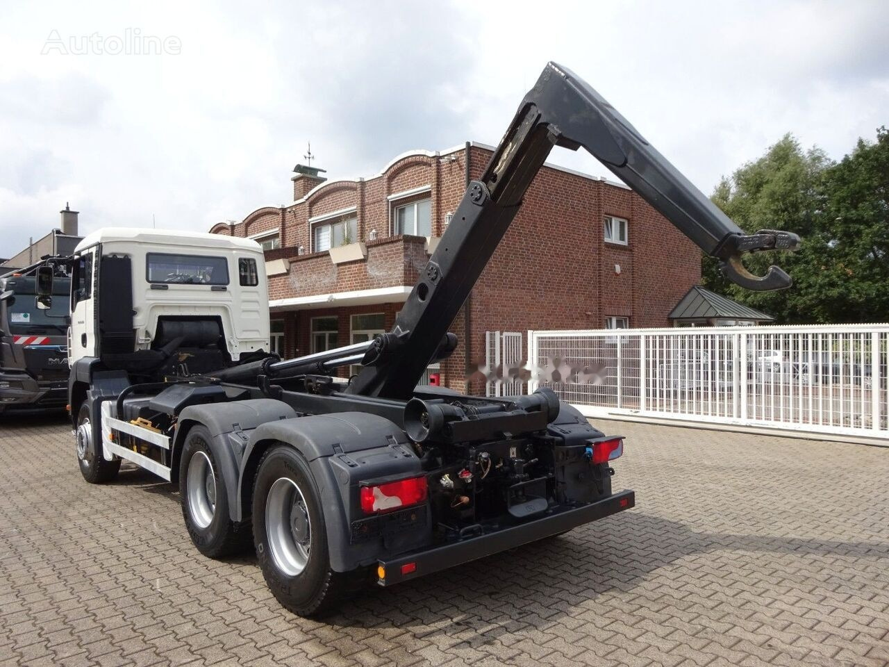 Camión multibasculante MAN 26.360 Meiller hook lif truck 6x4