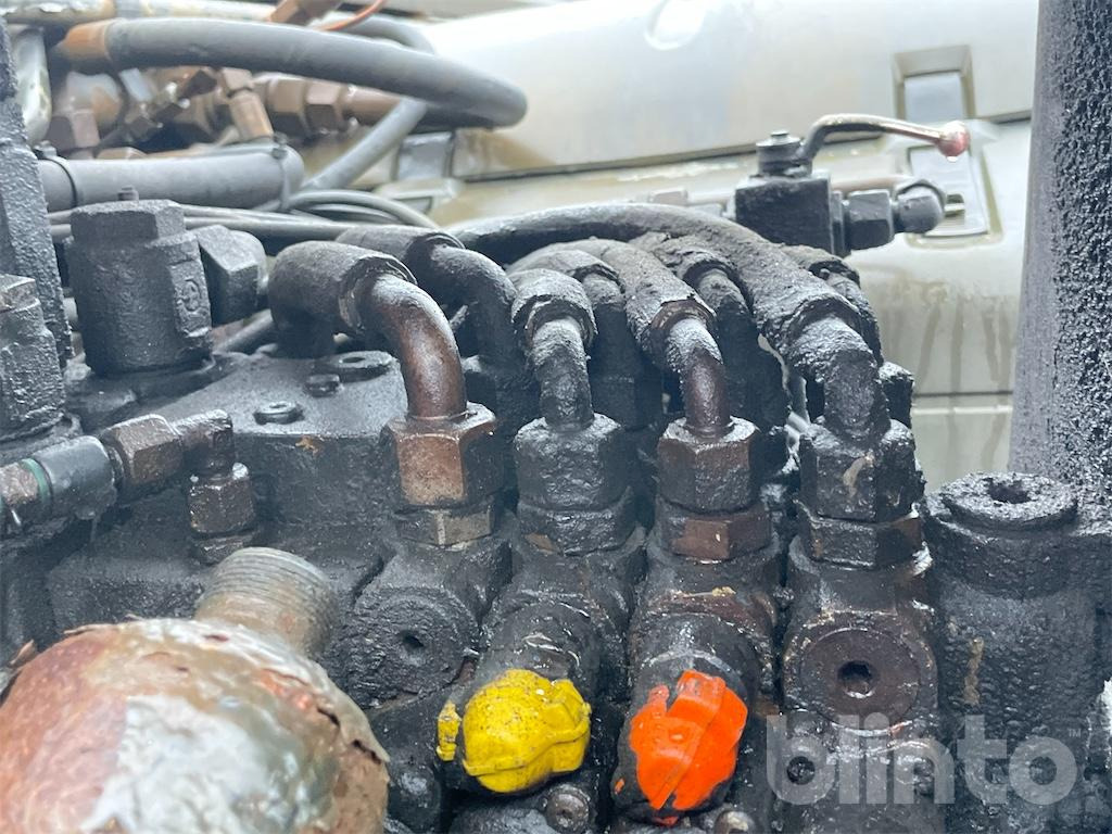 Camión multibasculante MAN TGA 26.430 (2007)