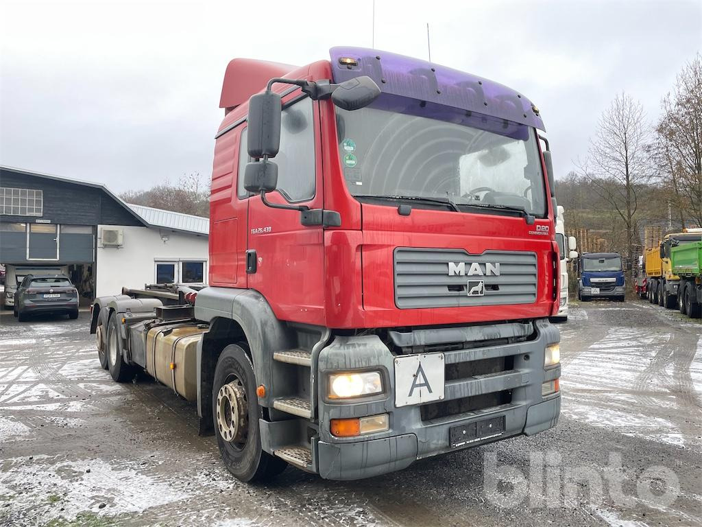 Camión multibasculante MAN TGA 26.430 (2007)