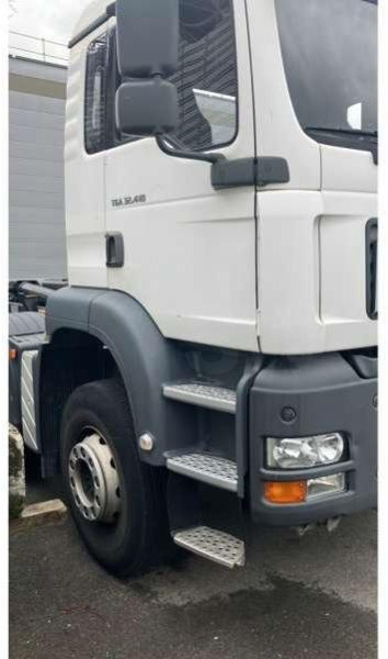 Camión multibasculante MAN TGA 32.413