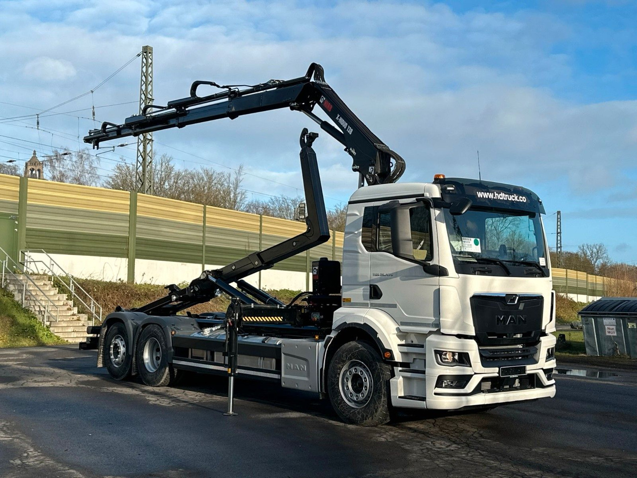Camión multibasculante MAN TGS 26.470 6x2 Abrollkipper + Kran Hiab 138-3
