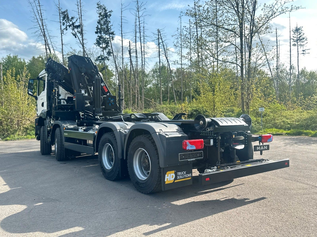 Camión multibasculante MAN TGS 35.520 8x4  Abrollkipper + Kran HIAB 228-6