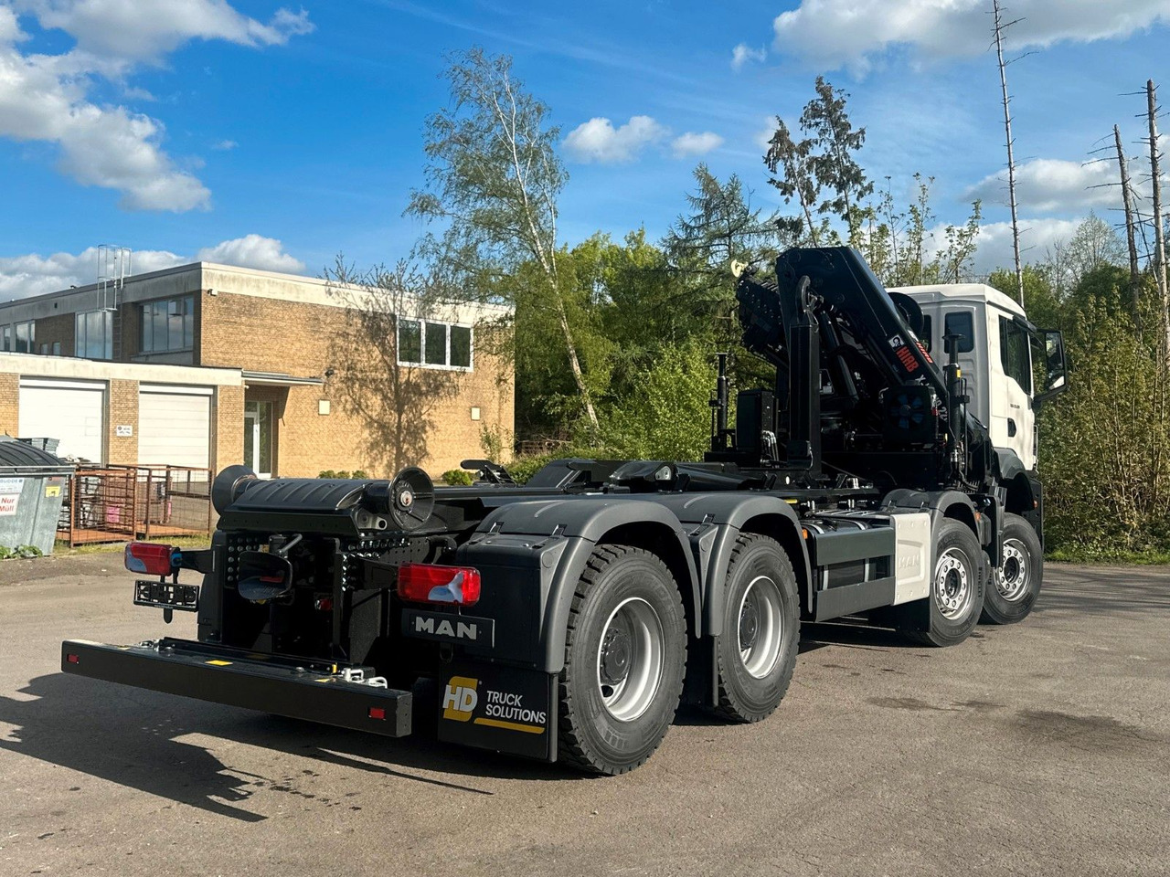 Camión multibasculante MAN TGS 35.520 8x4  Abrollkipper + Kran HIAB 228-6