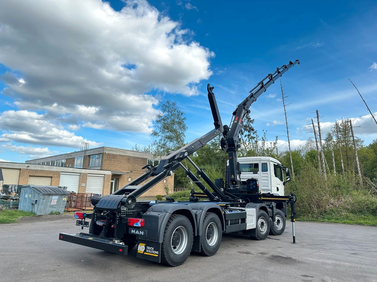 Camión multibasculante MAN TGS 35.520 8x4  Abrollkipper + Kran HIAB 228-6