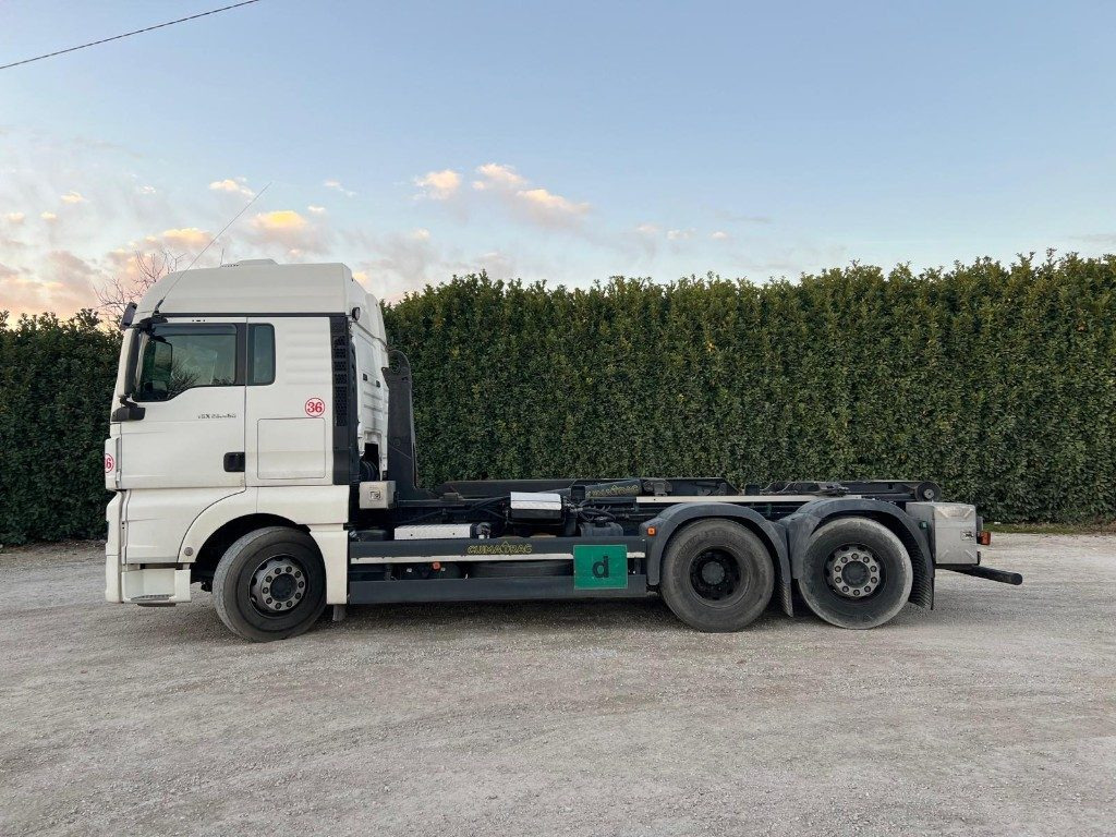 Camión multibasculante MAN TGX 26.480 USATO SCARRABILE