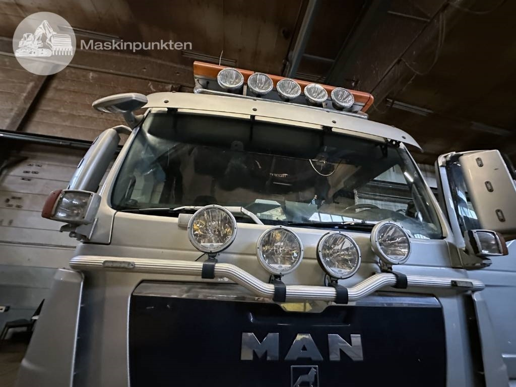 Camión multibasculante MAN TGX 35.540