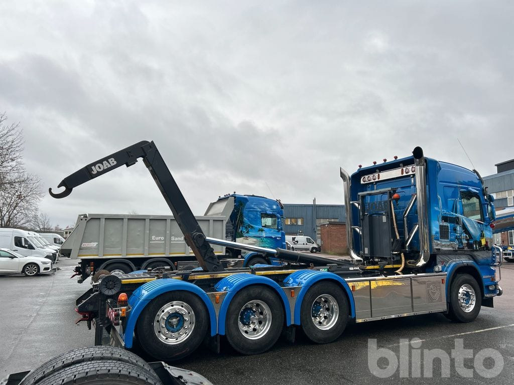 Camión multibasculante SCANIA R560LB 8X4*4 med JOAB 24T krok