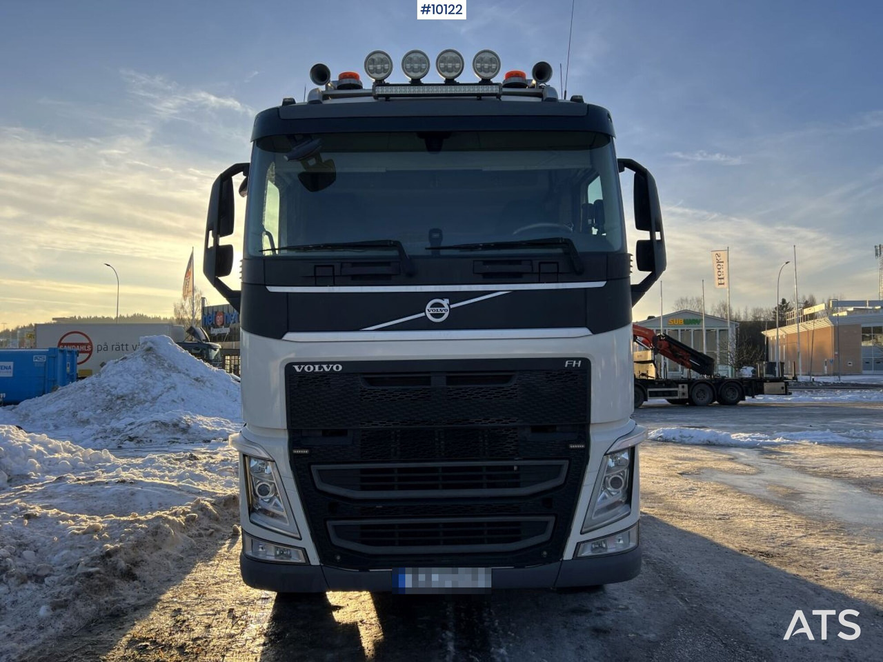 Camión multibasculante Volvo FH 8*4 Tridem Hooklift with flatbed