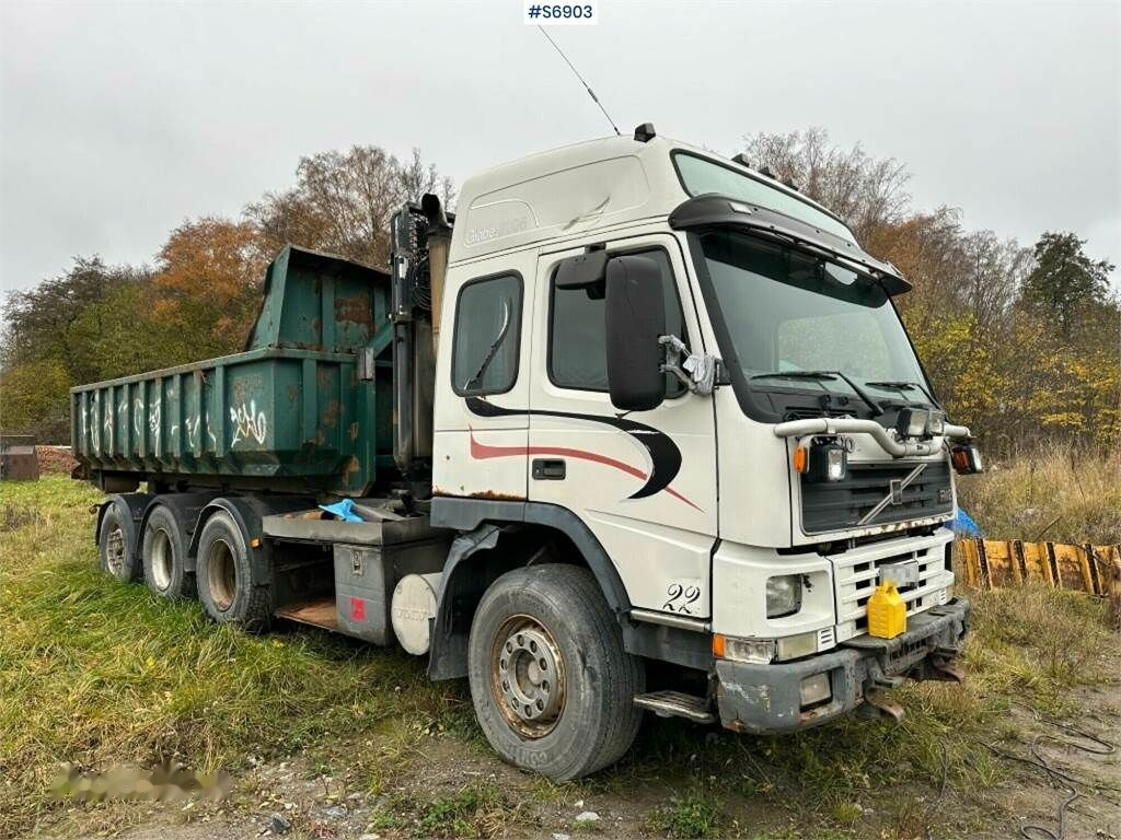 Camión multibasculante Volvo FM12 Hook truck with flatbed