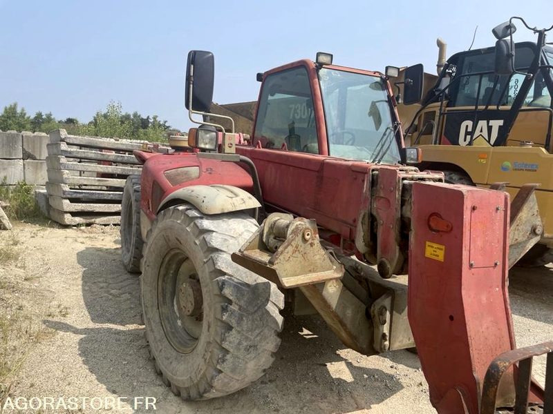 Manipulador telescópico TELESCOPIQUE MANITOU MT1233 - 2002 / 6849 HEURES