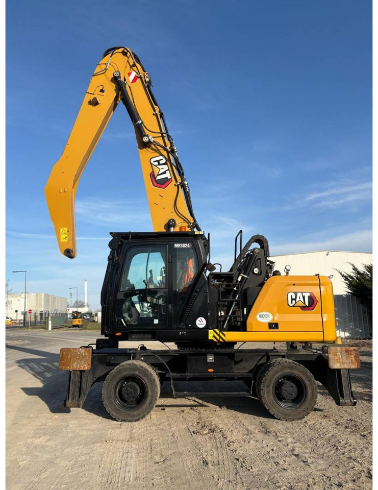 Excavadora de ruedas CAT MH3024
