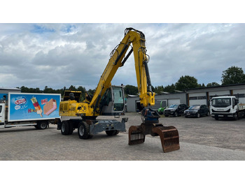 Manipulador de materiales Fuchs TeRex MHL 320 D Umschlagbagger Greifer Pratzen: foto 4