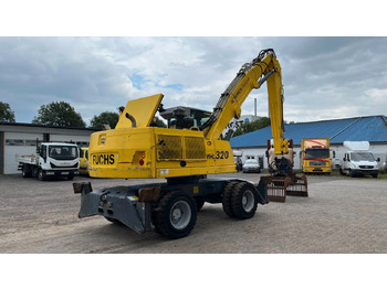 Manipulador de materiales Fuchs TeRex MHL 320 D Umschlagbagger Greifer Pratzen: foto 5