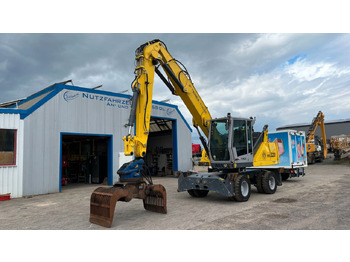 Manipulador de materiales Fuchs TeRex MHL 320 D Umschlagbagger Greifer Pratzen: foto 3