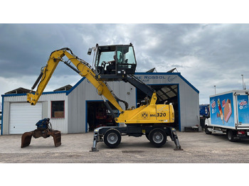 Manipulador de materiales Fuchs TeRex MHL 320 D Umschlagbagger Greifer Pratzen: foto 2