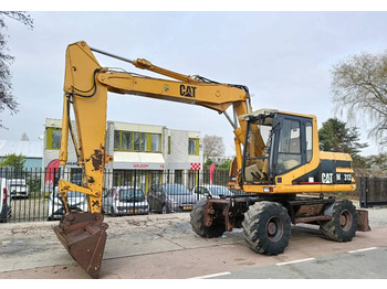 Excavadora de ruedas CAT M 312 mobiele mobile graafmachine excavator bagger: foto 1