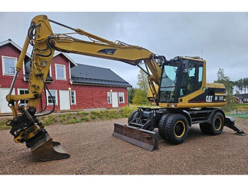 Excavadora de ruedas CATERPILLAR M312