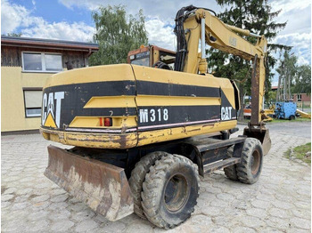 Excavadora de ruedas CATERPILLAR M318