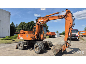 Arrendamiento de  ATLAS 1304 wheeled excavator (1993) ATLAS 1304 wheeled excavator (1993): foto 1