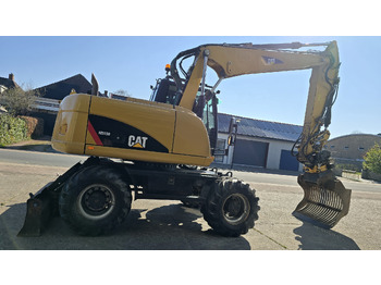 Excavadora de ruedas CATERPILLAR M313D: foto 4