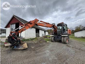 Excavadora de ruedas HITACHI ZX140W-3