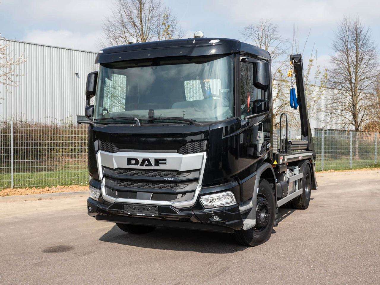 DAF FA XD 410 VDL Absetzkipper DAF FA XD 410 VDL Absetzkipper - Camión portacontenedor de cadenas: foto 1 DAF FA XD 410 VDL Absetzkipper DAF FA XD 410 VDL Absetzkipper - Camión portacontenedor de cadenas: foto 1
