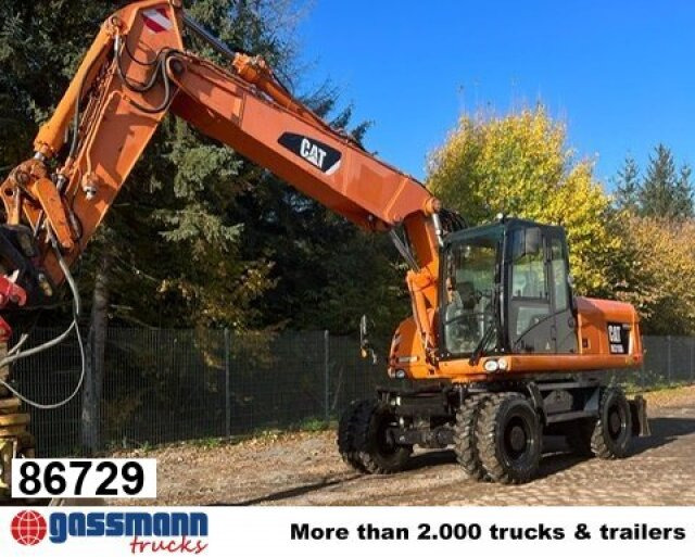 CAT M318D Mobilbagger - Maquinaria de construcción: foto 1 CAT M318D Mobilbagger - Maquinaria de construcción: foto 1
