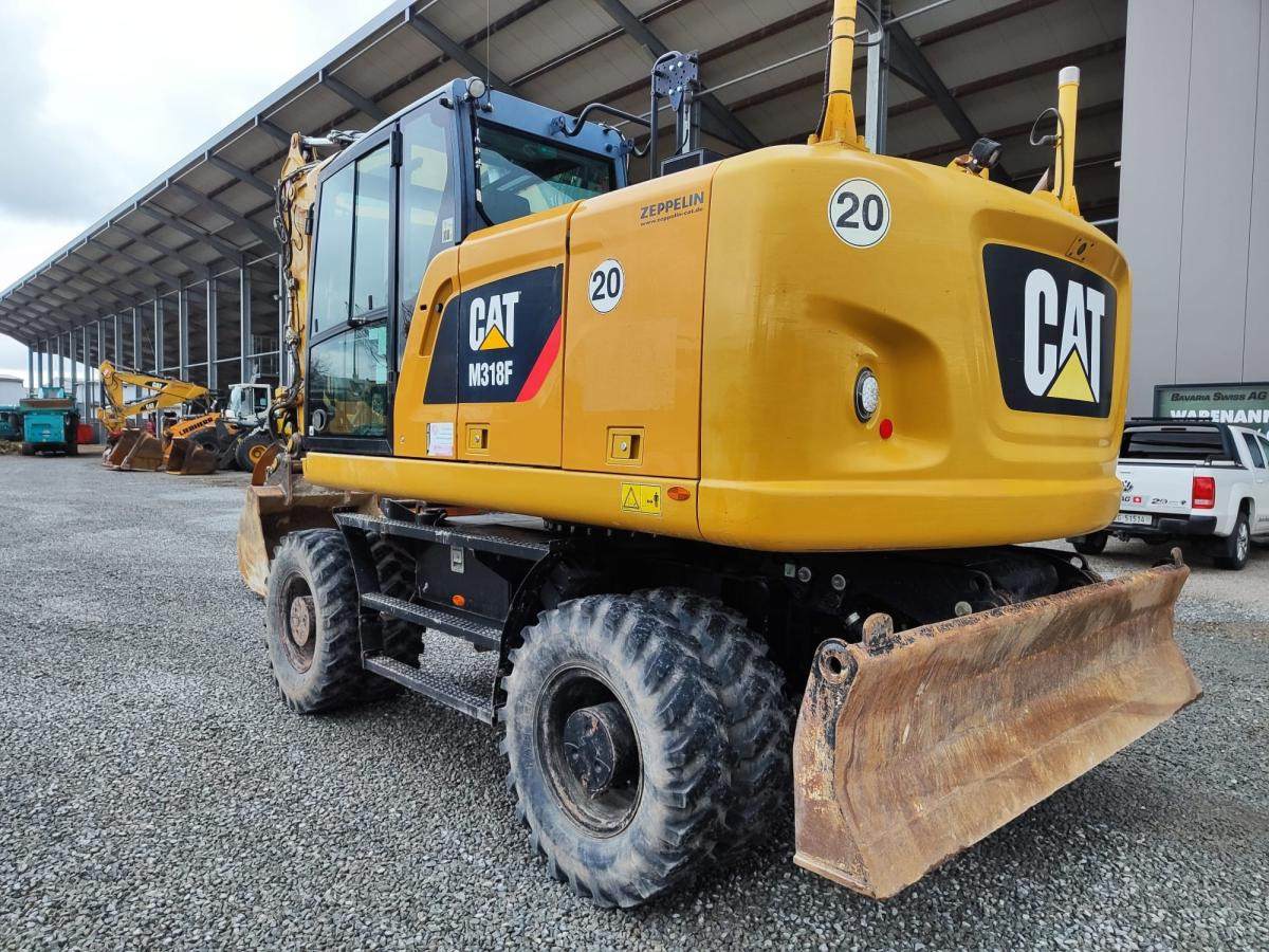 Caterpillar M318F - Excavadora de ruedas: foto 1 Caterpillar M318F - Excavadora de ruedas: foto 1