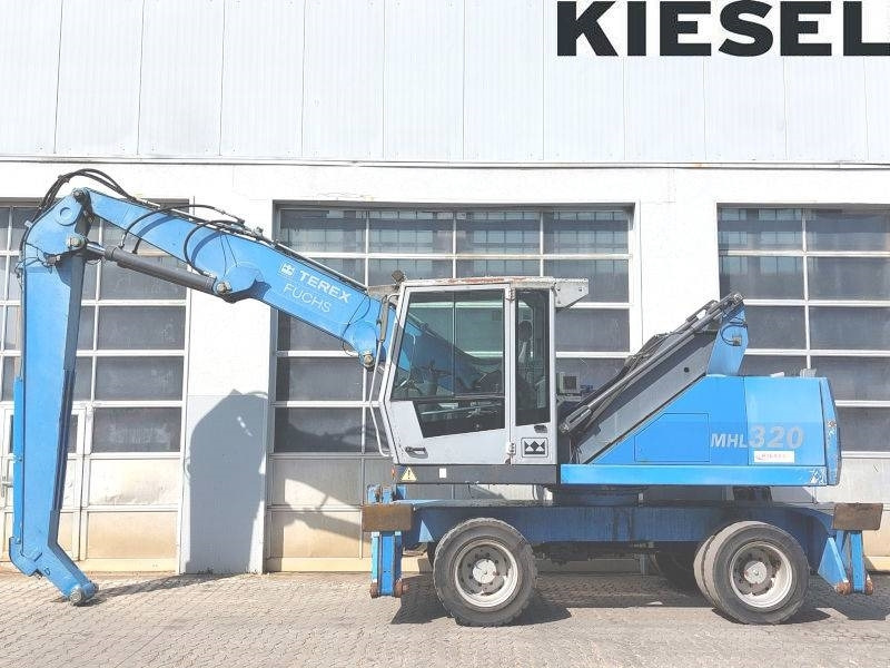 Fuchs MHL 320 F - Manipulador de materiales: foto 1 Fuchs MHL 320 F - Manipulador de materiales: foto 1