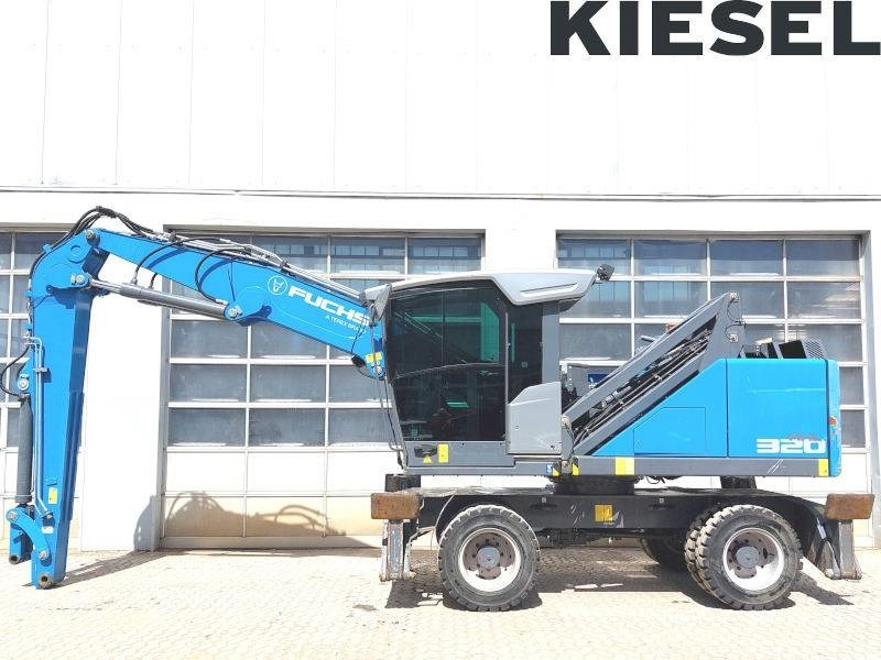 Fuchs MHL 320 F - Manipulador de materiales: foto 1 Fuchs MHL 320 F - Manipulador de materiales: foto 1