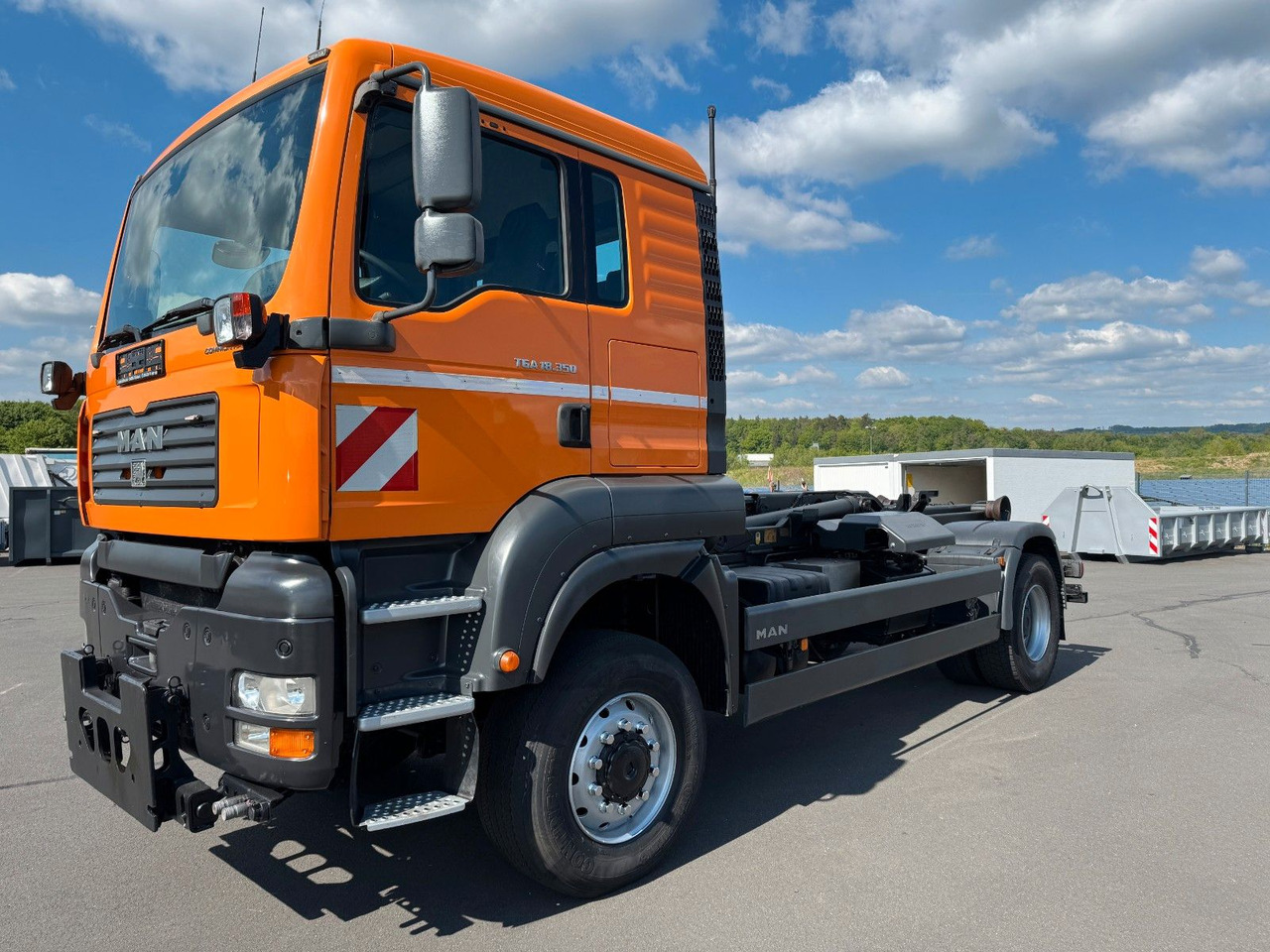 MAN TGA 18.350 4x4 Meiler Abroller RK 14.45 Winterd. - Camión multibasculante: foto 1 MAN TGA 18.350 4x4 Meiler Abroller RK 14.45 Winterd. - Camión multibasculante: foto 1