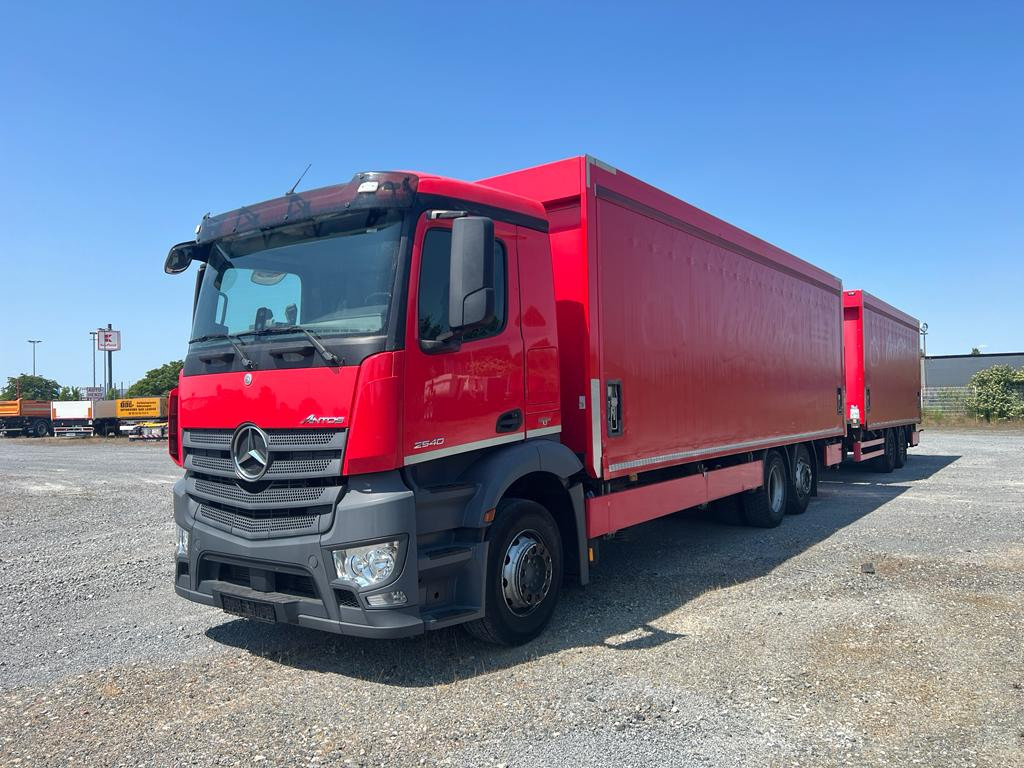 MERCEDES-BENZ Antos 2540 L 6x2 Pritsche LBW Coca Cola, 8,2m Getränke - Camión lona: foto 1 MERCEDES-BENZ Antos 2540 L 6x2 Pritsche LBW Coca Cola, 8,2m Getränke - Camión lona: foto 1