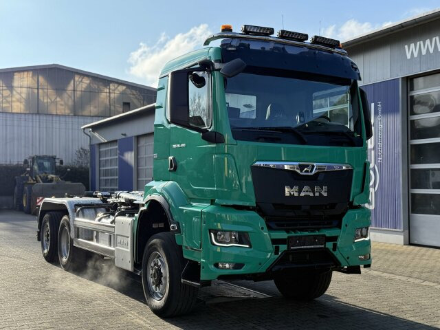MAN TGS 28.480 6x4 Abrollkipper Meiller RS21.65 - Camión multibasculante: foto 1 MAN TGS 28.480 6x4 Abrollkipper Meiller RS21.65 - Camión multibasculante: foto 1
