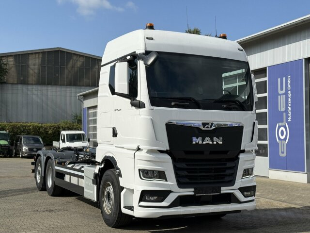 MAN TGX 26.520 6x2 Abrollkipper MEILLER RS 21.70 - Camión multibasculante: foto 1 MAN TGX 26.520 6x2 Abrollkipper MEILLER RS 21.70 - Camión multibasculante: foto 1