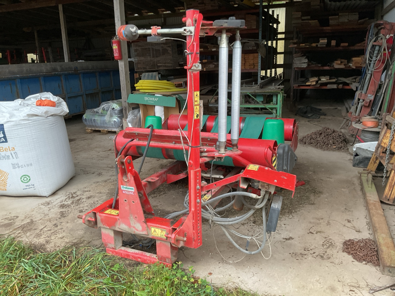 Kverneland 7558 - Encintadora de pacas: foto 1 Kverneland 7558 - Encintadora de pacas: foto 1