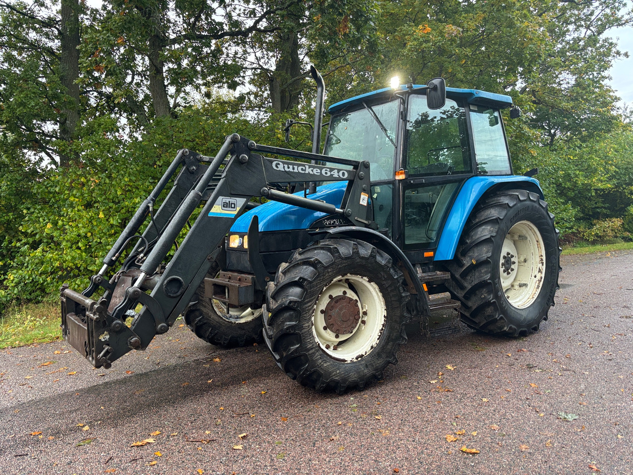 New Holland 6635 - Tractor: foto 1 New Holland 6635 - Tractor: foto 1