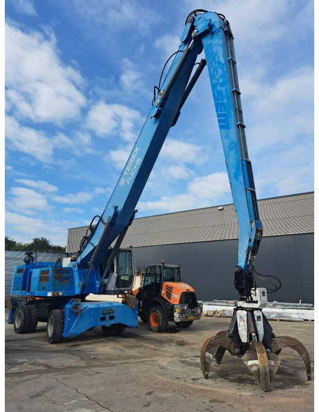 Fuchs MHL360D with low hour engine + grapple - Manipulador de materiales: foto 3 Fuchs MHL360D with low hour engine + grapple - Manipulador de materiales: foto 3