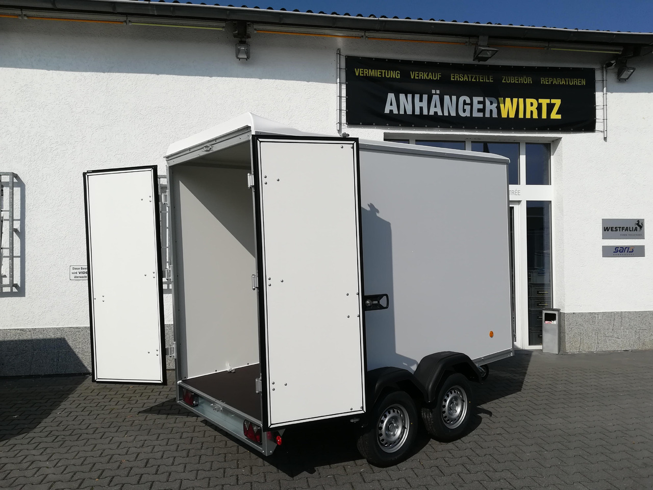 Böckmann Koffer KT 3015/20 H weiß glatt 301x150x202cm (M) 2000kg Modell 2023 - Remolque caja cerrada: foto 4 Böckmann Koffer KT 3015/20 H weiß glatt 301x150x202cm (M) 2000kg Modell 2023 - Remolque caja cerrada: foto 4