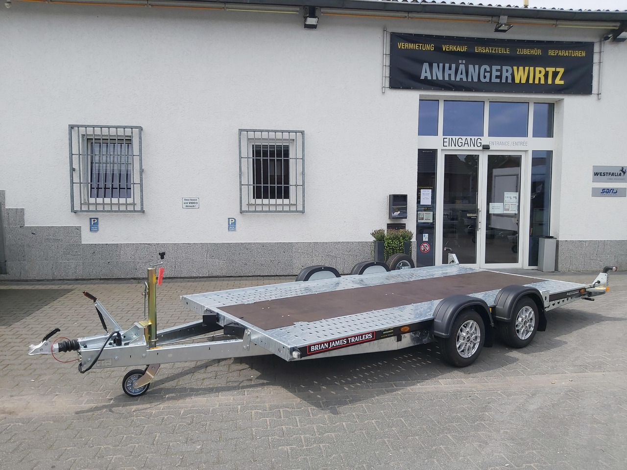 Brian James A4 Transporter 450x200cm black X Rampen 240cm Stützen Alufelgen silver 2600kg - Remolque portavehículos: foto 1 Brian James A4 Transporter 450x200cm black X Rampen 240cm Stützen Alufelgen silver 2600kg - Remolque portavehículos: foto 1