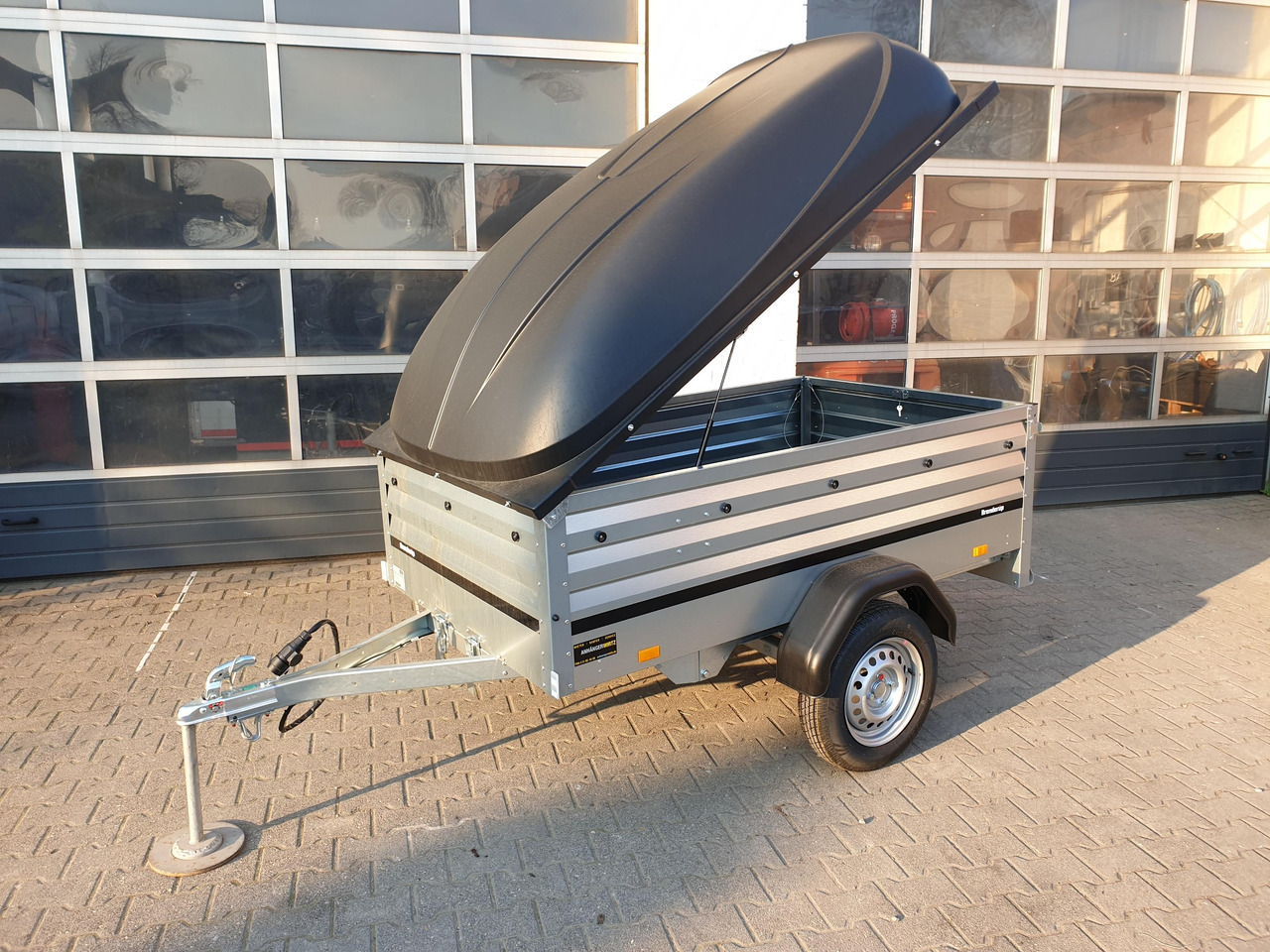 Deckelanhänger Brenderup 1205 SXLUB 750 203x116x55cm mit ABS Deckel schwarz 750kg online Aktion - Remolque de coche: foto 1 Deckelanhänger Brenderup 1205 SXLUB 750 203x116x55cm mit ABS Deckel schwarz 750kg online Aktion - Remolque de coche: foto 1