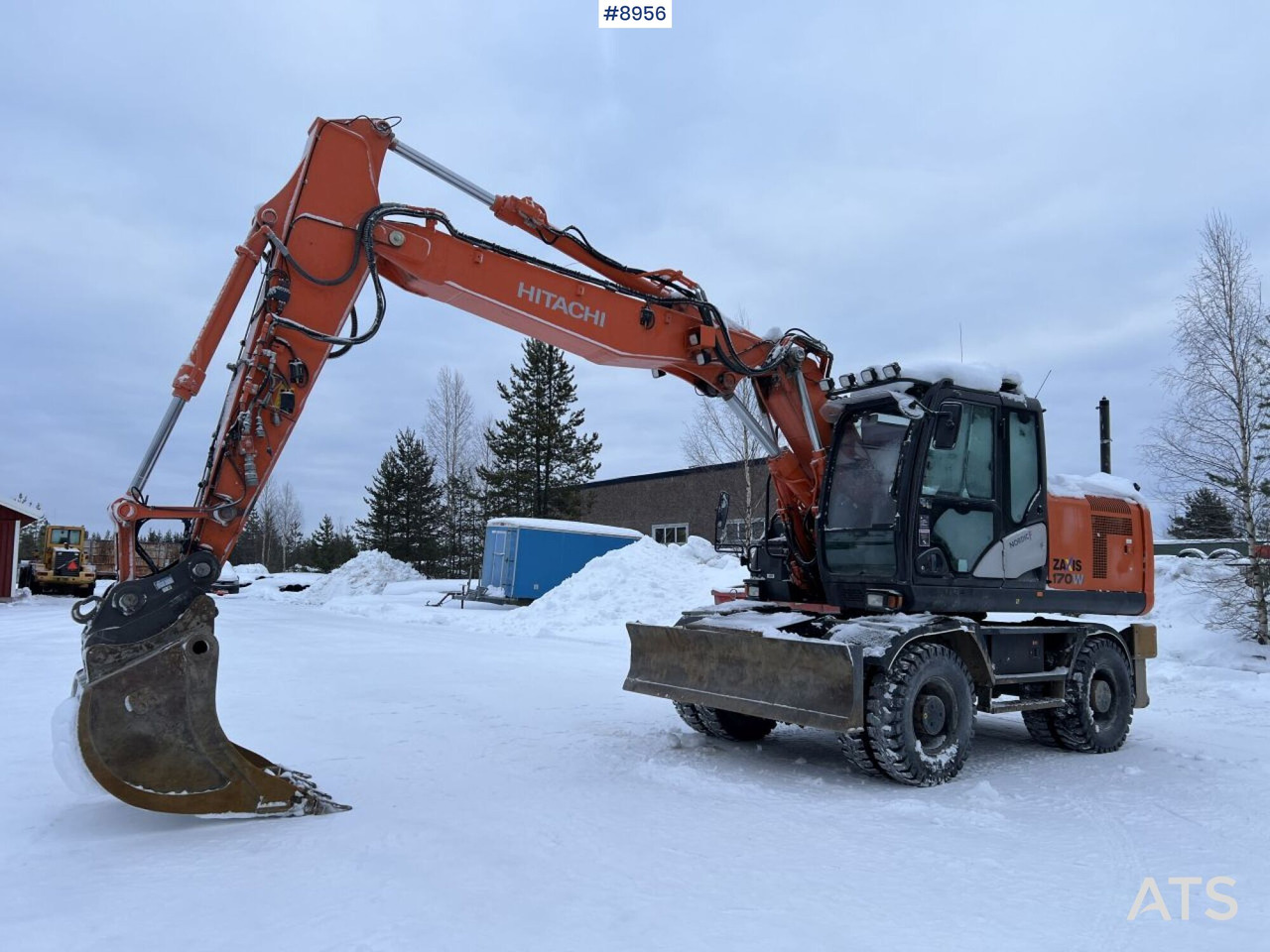Hitachi ZX 170 W Wheeled excavator with tipper wagon and attachments - Excavadora de ruedas: foto 1 Hitachi ZX 170 W Wheeled excavator with tipper wagon and attachments - Excavadora de ruedas: foto 1