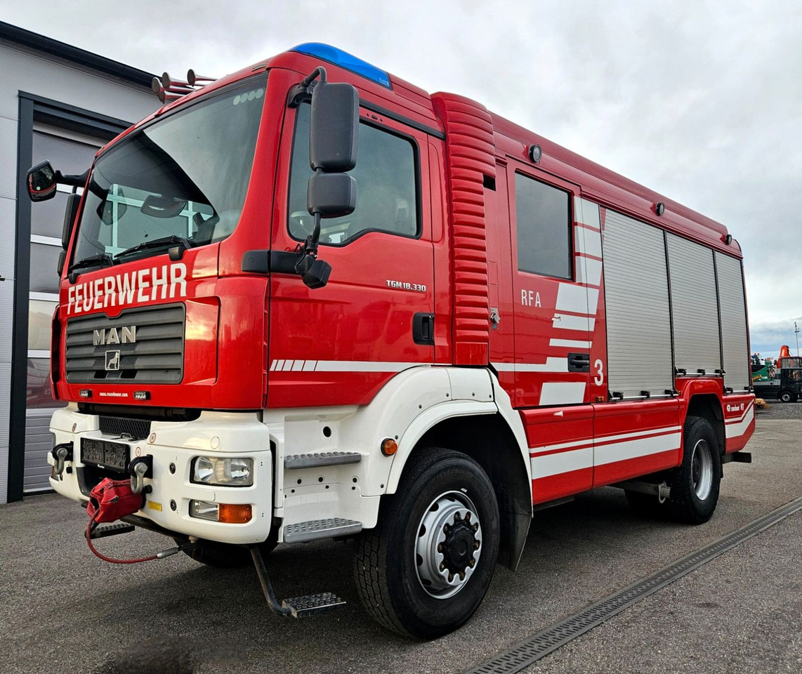 MAN TGM 18.330 4x4 Feuerwehr Rosenbauer RFA - Camión: foto 1 MAN TGM 18.330 4x4 Feuerwehr Rosenbauer RFA - Camión: foto 1